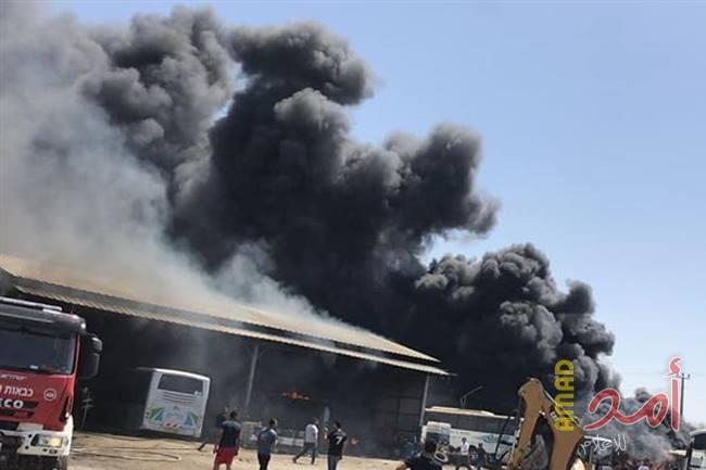 بالصور.. حريق هائل في موقف للحافلات داخل اسرائيل