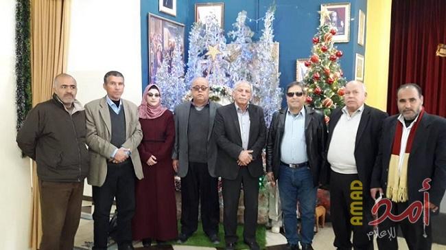 وفد من جبهة النضال الشعبى يشارك المسيحيين احتفالاتهم بعيد الميلاد المجيد بغزة