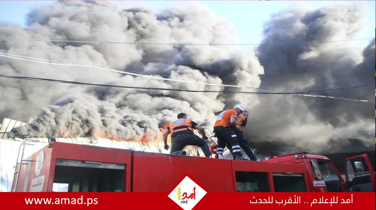 إصابتان جرّاء نشوب حريق اندلع في مخزن للسجاد في غزة - فيديو