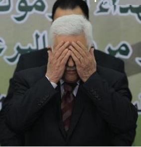مدير الوقائي سابقا يهدد الرئيس عباس بالقضاء