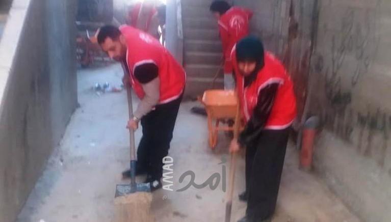 غزة: "الوحدة العمالية"  و"لجان العمل النسائي" ينظمان يوم عمل تطوعي في مخيم الشاطئ