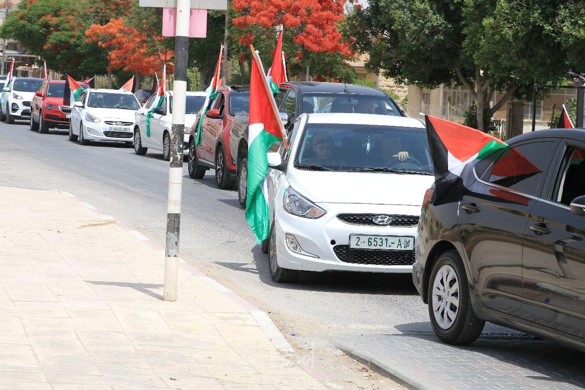 جامعة الاستقلال تنظم مسيرة أعلام فلسطينية في أريحا