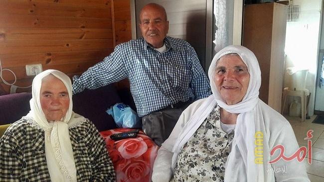 بالصور - انتصار طه ستون عامًا من العطاء.. أول امرأة حملت العلم الأحمر في أول أيار بالناصرة