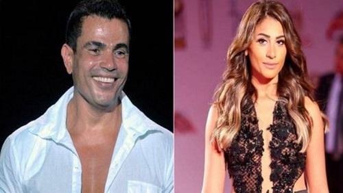 عمرو دياب ينقذ دينا الشربيني على المسرح بالرياض .. شاهد