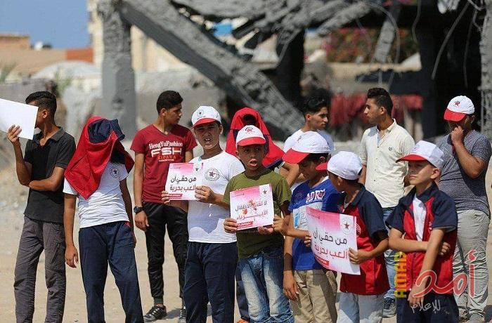 أطفال غزة يشاركون بوقفة تضامنية مع الشهيدين "كحيل والنمرة" (صور)