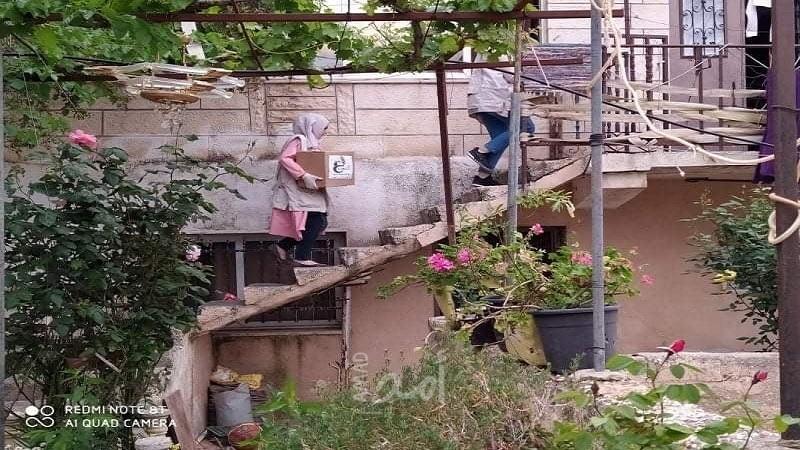رام الله: جمعية النجدة الاجتماعية لتنمية المرأه الفلسطينية توزع طروداً غذائية