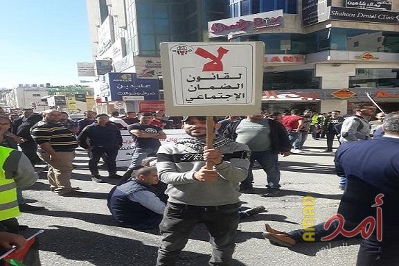 الخليل: مسيرة للحراك العمالي للمطالبة باسقاط قانون الضمان الاجتماعي