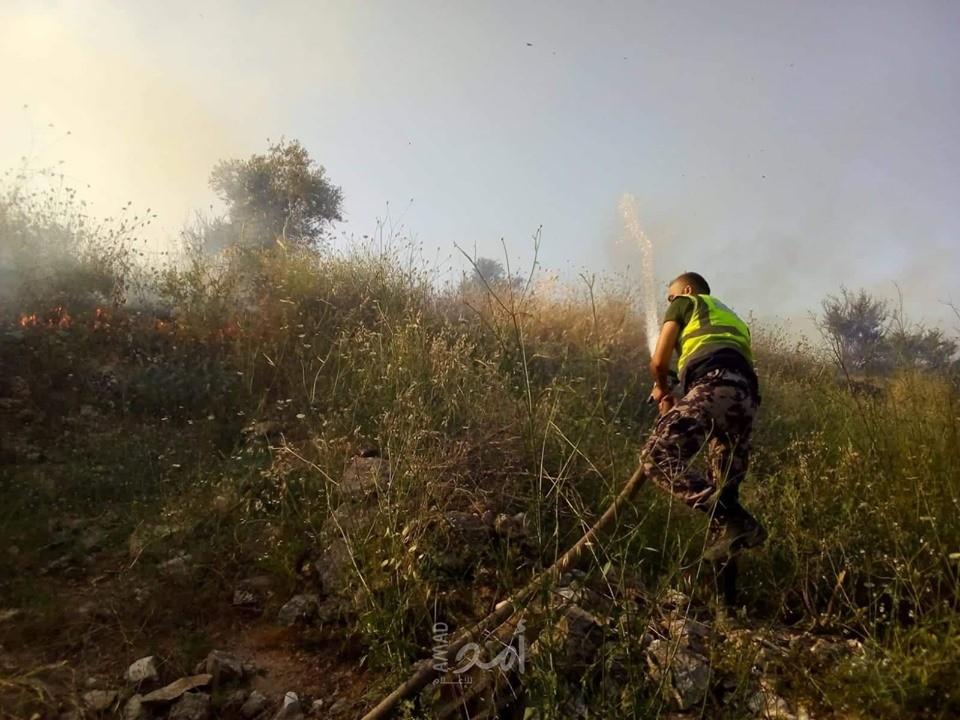 اندلاع النيران بعشرات الدونمات الزراعية شرق جنين