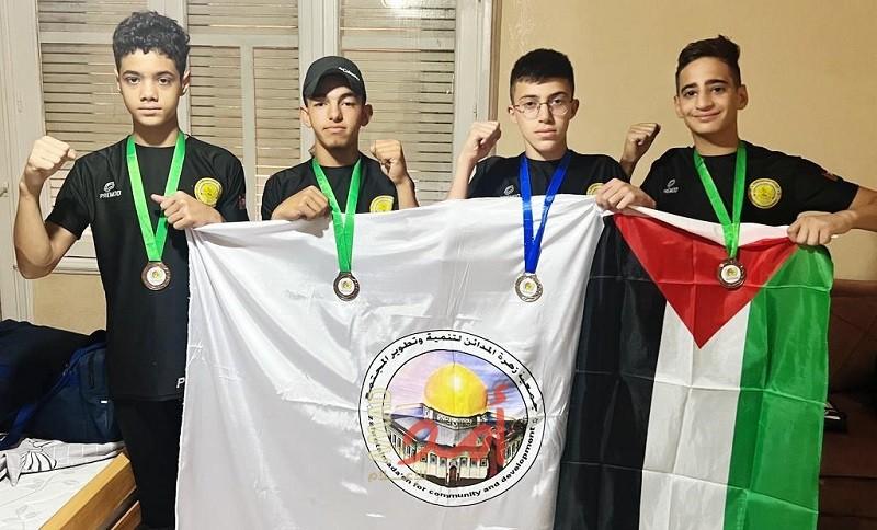 فريق فلسطين لـ"الووشو كونغ فو" للشباب في مصر يحصد مدالية فضية و(3) برونزيه