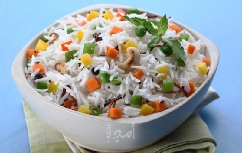 لعشاق الرجيم والأكلات النباتية.. إليكم طريقة عمل أرز بالخضار؟!