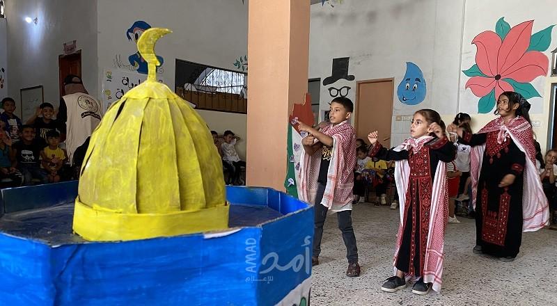 خانيونس: مركز شباب الأمة يختتم مخيم الطفولة (3)