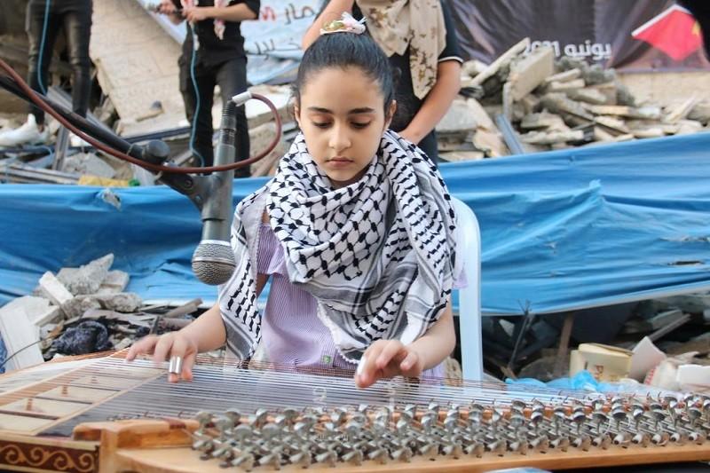غزة: "الشباب والثقافة ومنتدى الأمة" ينظمان أمسية ثقافية على أنقاض برج هنادي