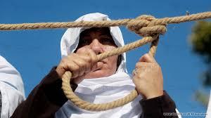 مشانق رمزية في اعتصام  لأهالي شهداء عدوان 2014 بغزة
